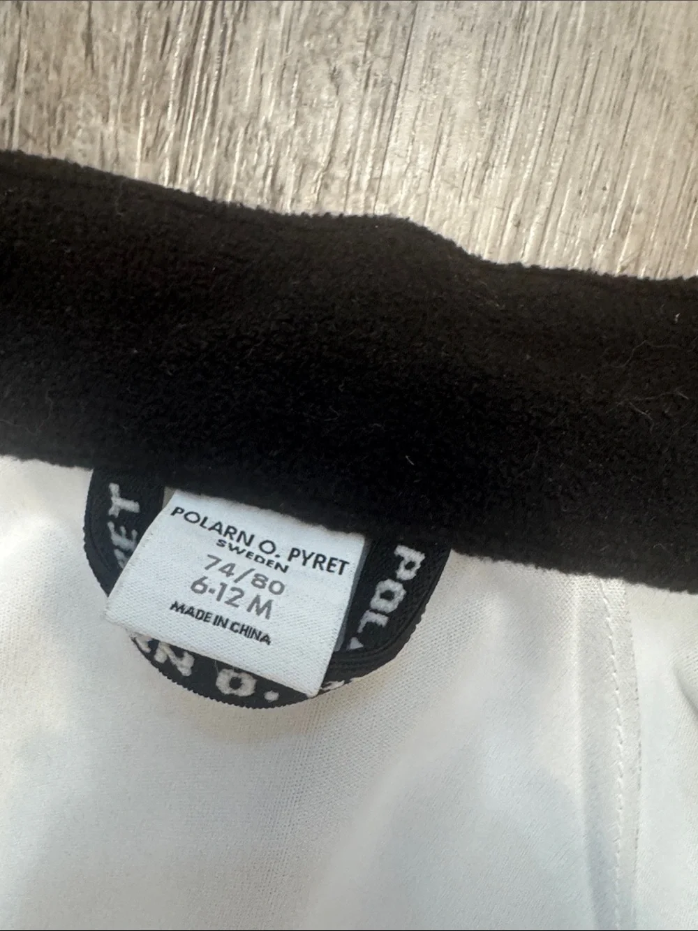 Polarn O. Pyret Black Kids Bomber-Style Rain Jacket with Reflective Stripe
